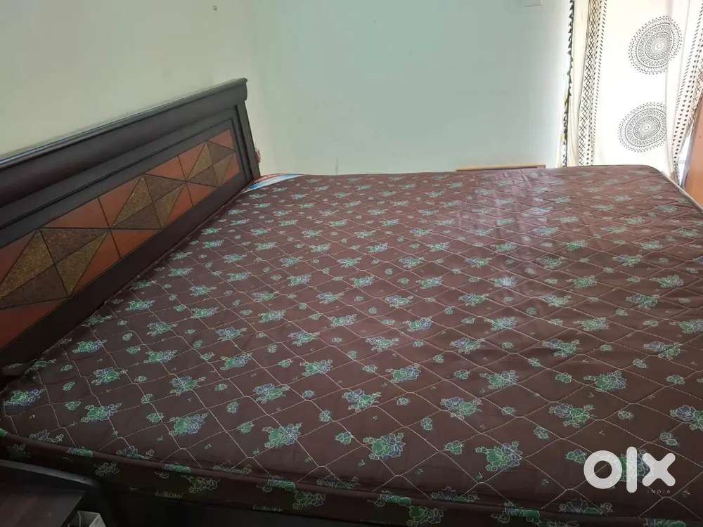 King sized mattress with matching bed