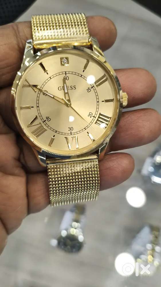 Guess brand golden watch show room piece