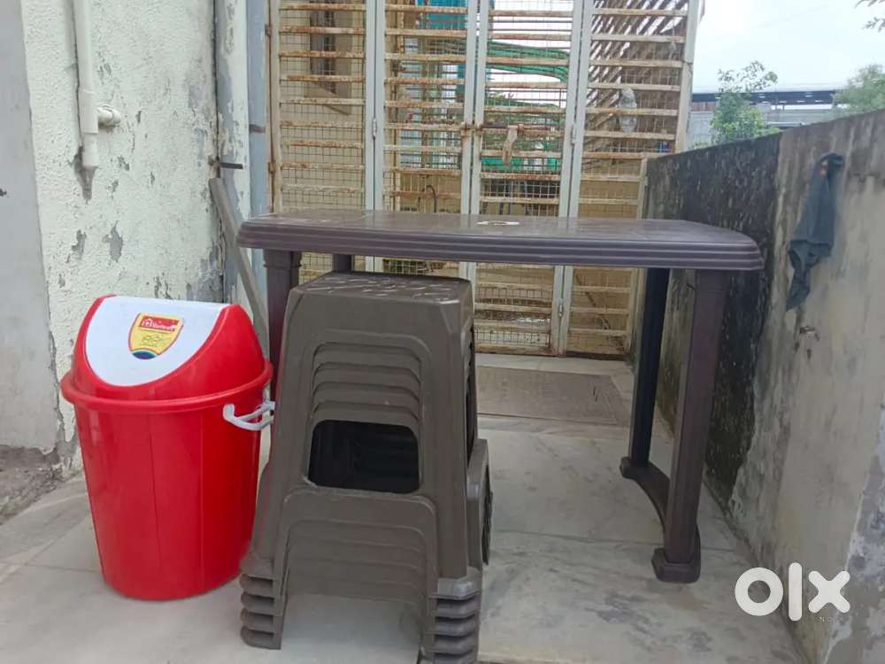 Table Chairs and Dustbin