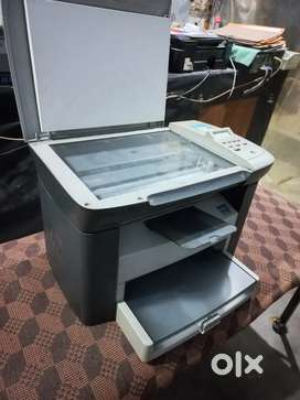 HP laser scanner printer M1005