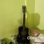 Inter 38c guiter with guitar bag and guitar pic