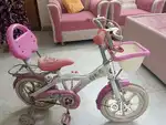 Bicycle  of pink and white colour