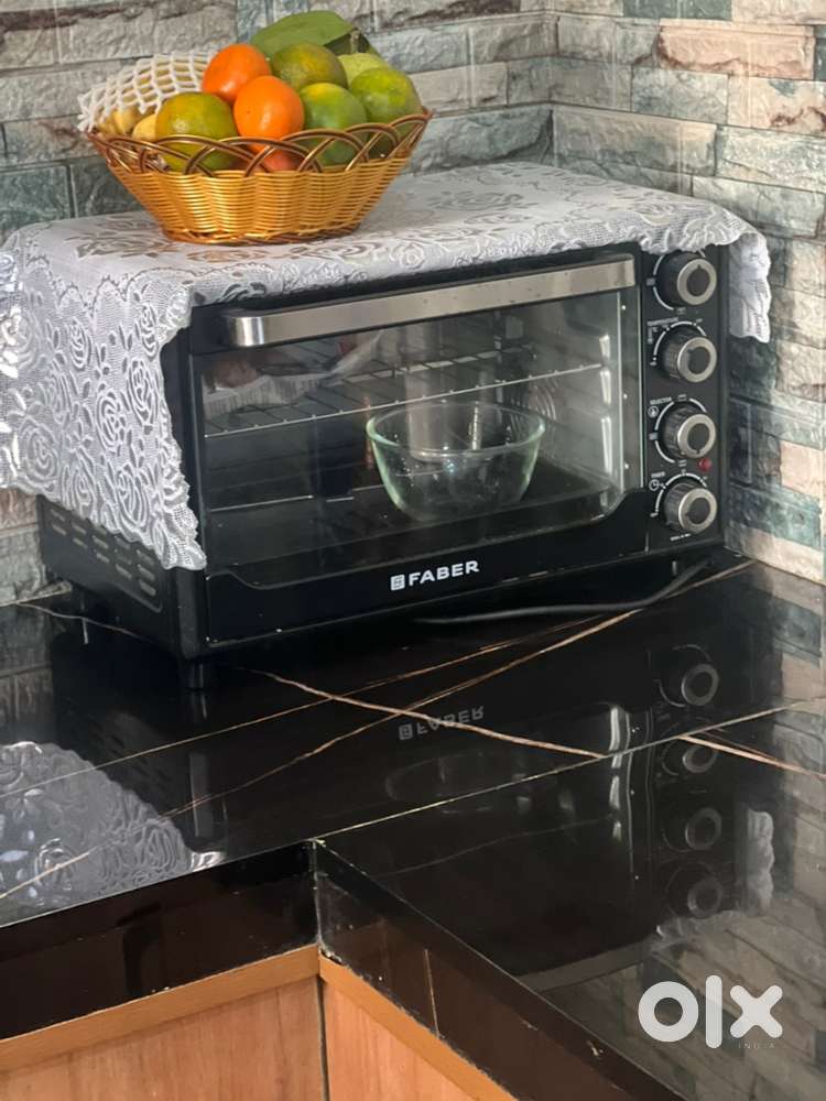 Otg faber oven along with proper accessories