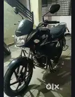 HONDA SHINE Advocate using the bike