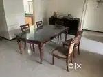 6 seater wodden dining table witb12 mm toughened beveled glass