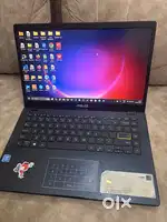 Asus Vivobook 14 with Dell bluetooth keyboard.
