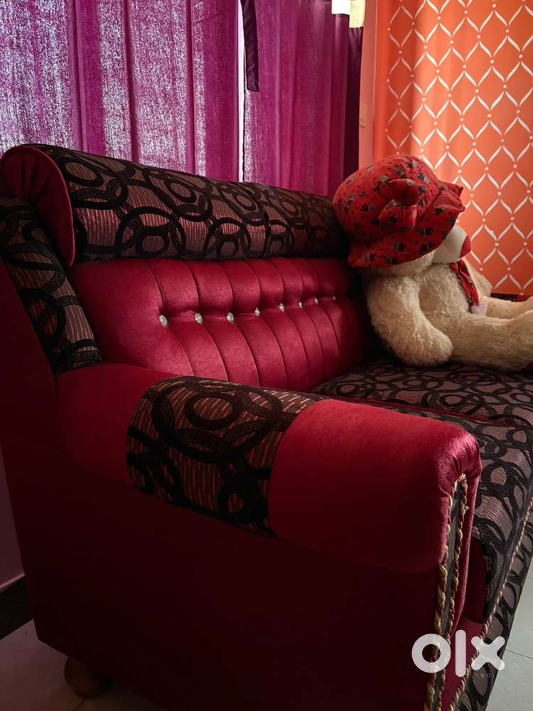 3 seater maroonish red hardy sofa, aged 2 years
