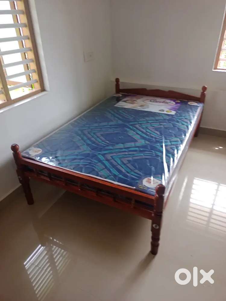 New coconut double cot with mattress 5500/-.