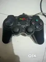 Redgear PS2 Style controller. With madfinesh on buttons