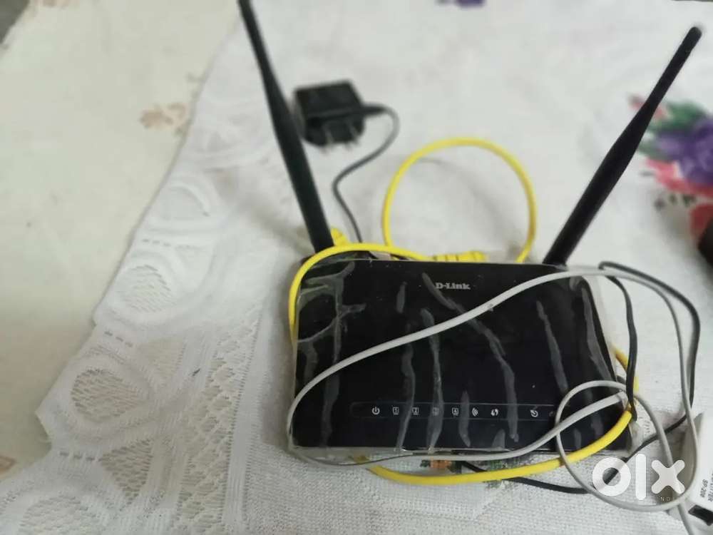 D-Link DSL-2750U Wireless N 300 ADSL2+ Modem Router