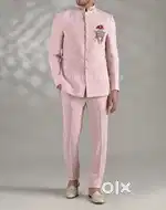Light pink designer jodhpuri two piece suit.