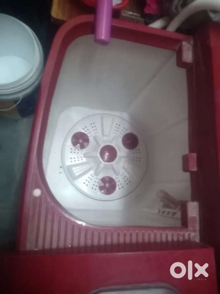 Red colour washing machine urgent motar porablam