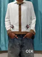 White shirt with brown border and embroidery work
