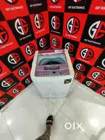 Lg 6 kg pink & white colour fully automatic machine in working conditn