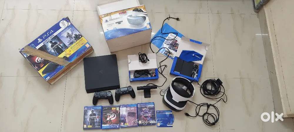Ps4 slim 500gb with games and  PsVR with camera full set.