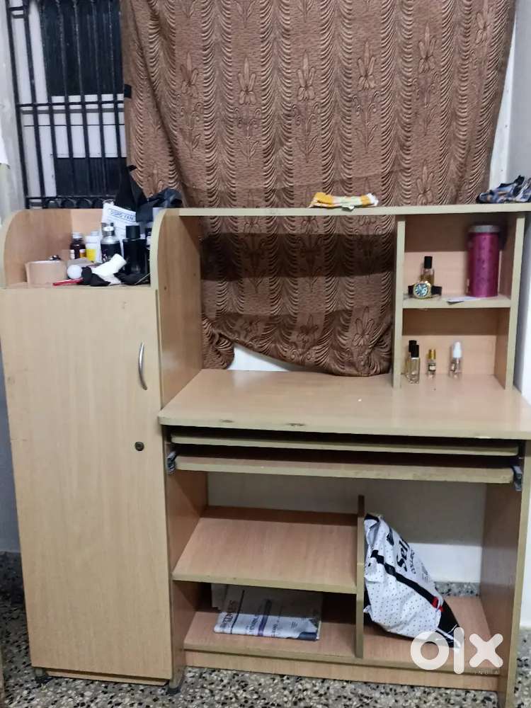 Computer table with storage area