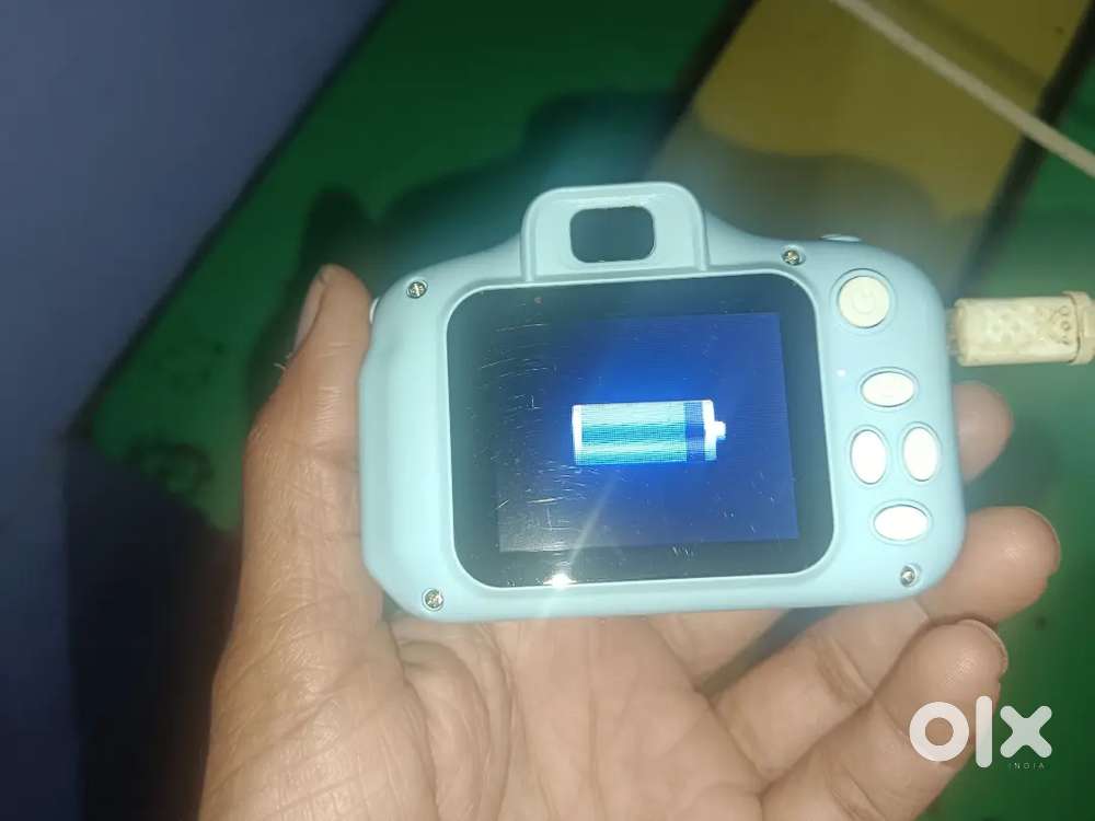Game stick with videos games. 2 gamepad . 3 1 children digital camera