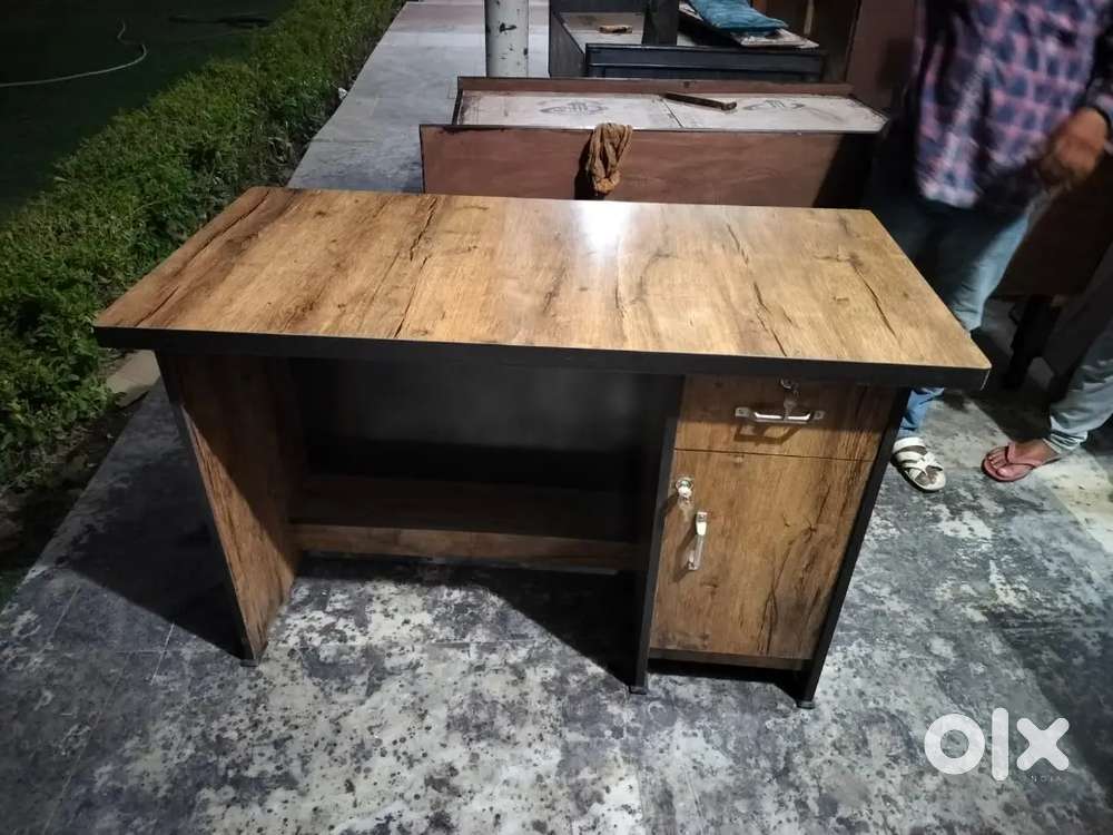Wooden new unused office table 48*24 inch available
