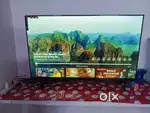 Brand new 48 inch smart Android ultra hd O led tv with sound bar Alexa