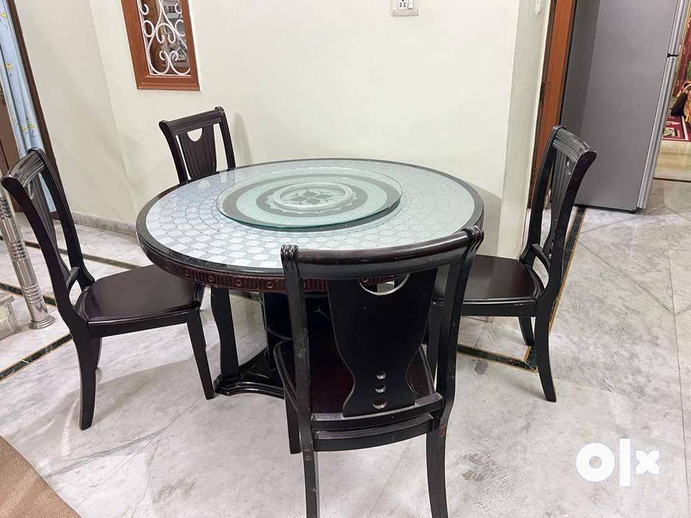 Revolving Glass top and bottom shelves Dining Table
