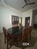 Six saeter teek wood dining table