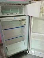 Old SANYO fridge at running condition