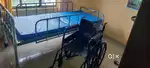 One surgical Bed with mattress and one wheel Chair in good condition