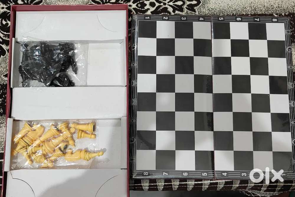 Chess set and Pradeep side book for class 12th biology