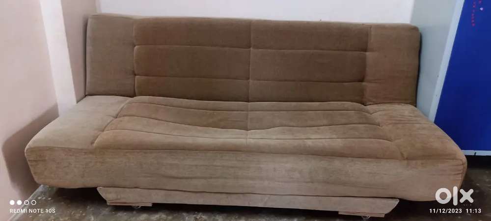 Folding sofa cum bed
