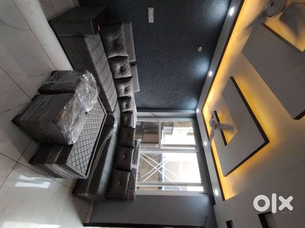 L shape sofa with cushions