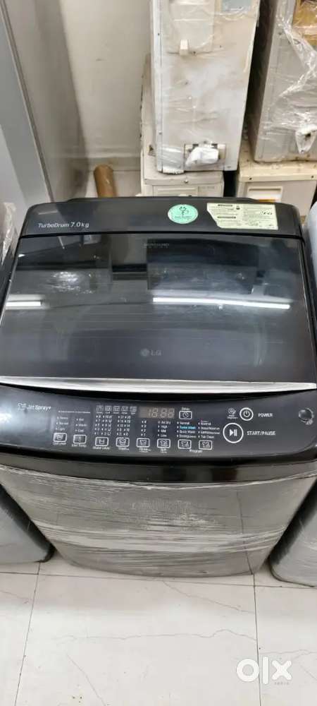 LG washing machine fully automatic top load with warranty and good con