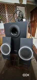 Speaker with two bass
