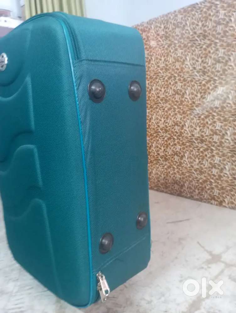 One large and small suitcase