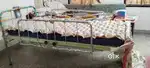 Hospital cot with bed