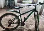 21 gear cycle of green and black rarely used and about 2 years old