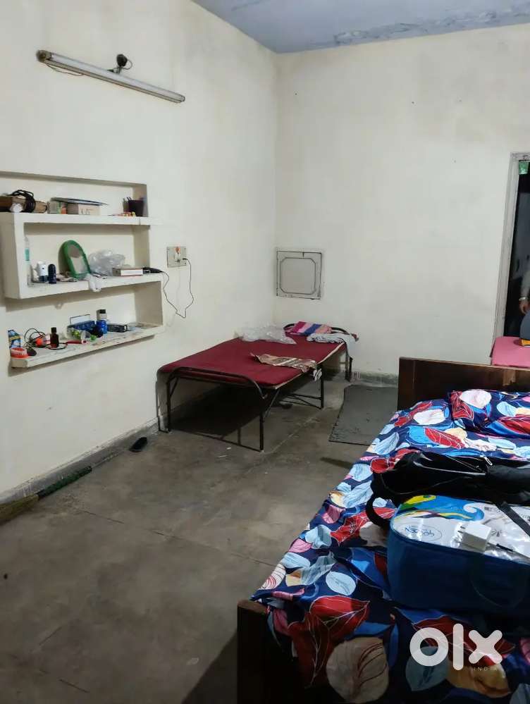 Room with attached kitchen