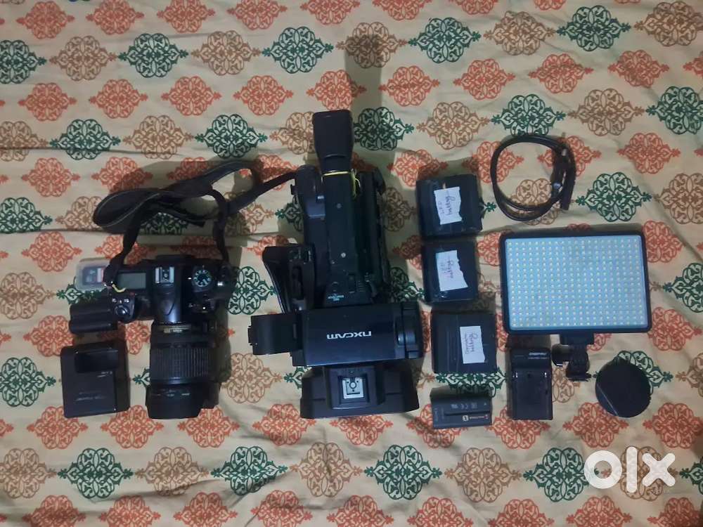 SONY NX100 OR NIKON D7000