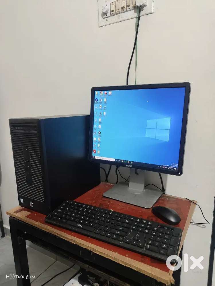 A computer with keyboard mouse & monitor