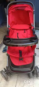 Baby pram and rocking cradle.