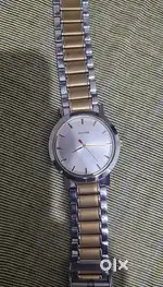 Sonata watch silver with gold metal strip