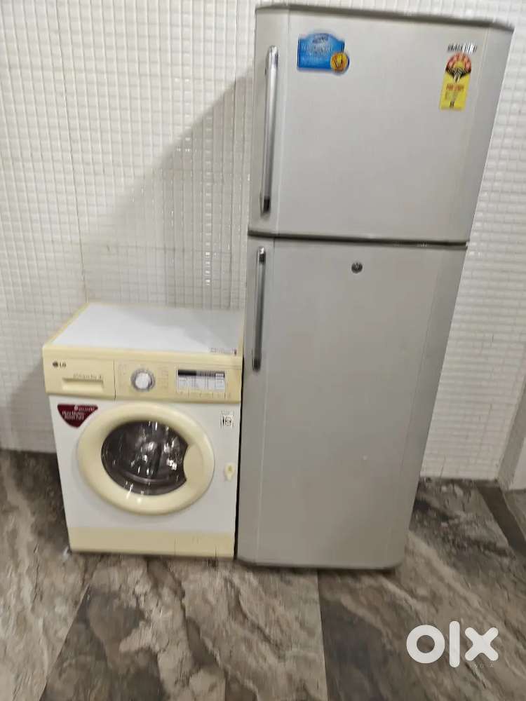 Fee 5512 Lg front load and Samsung double door refrigerator