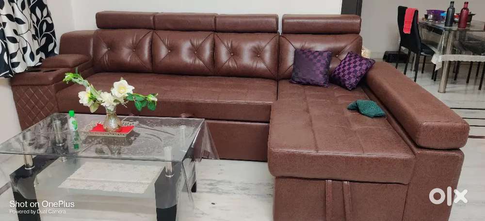 L-Shaped SOFA cum BED & GLASS TEAPOY with presitine condition 4 sale.