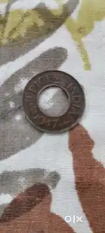 A 1 pice coin of year 1947
