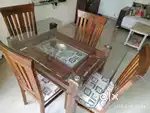 4 seater wooden dining table for sell. Price negotiable..