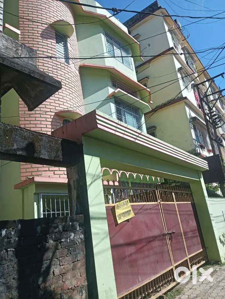 Asram road 3 khatha plot with house for sale at