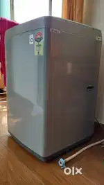 LG 6.5 kg top load machine available at 8K