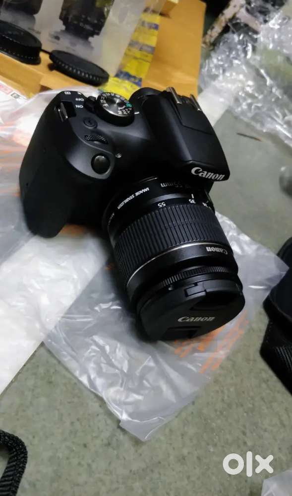Canon 1500d body+18-55mm lens+2 battery+lens hood+64gb memory card