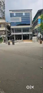 9cents plot with9000 sqft commercial building for sale at Palarivattom