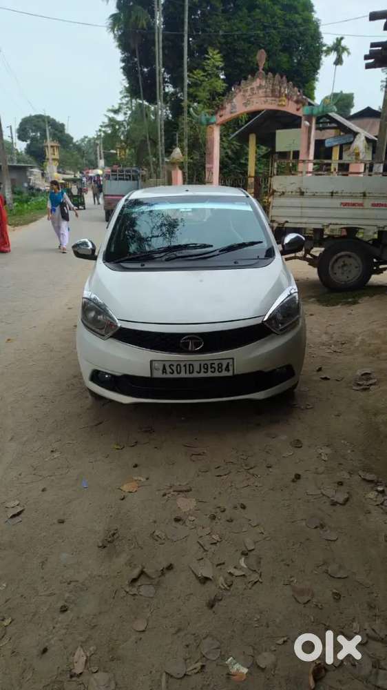 Tata Tiago new condition and 2nd owner car white colour if interested