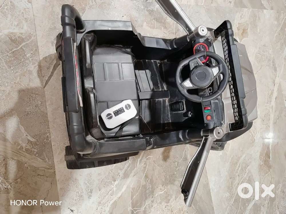 Electric toy car , Very less used , all functions working
